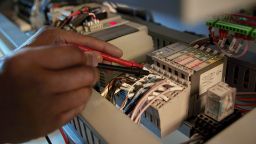 A student working on a mechatronics project