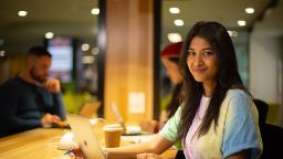 International student Geilee in library study space on Hawthorn campus