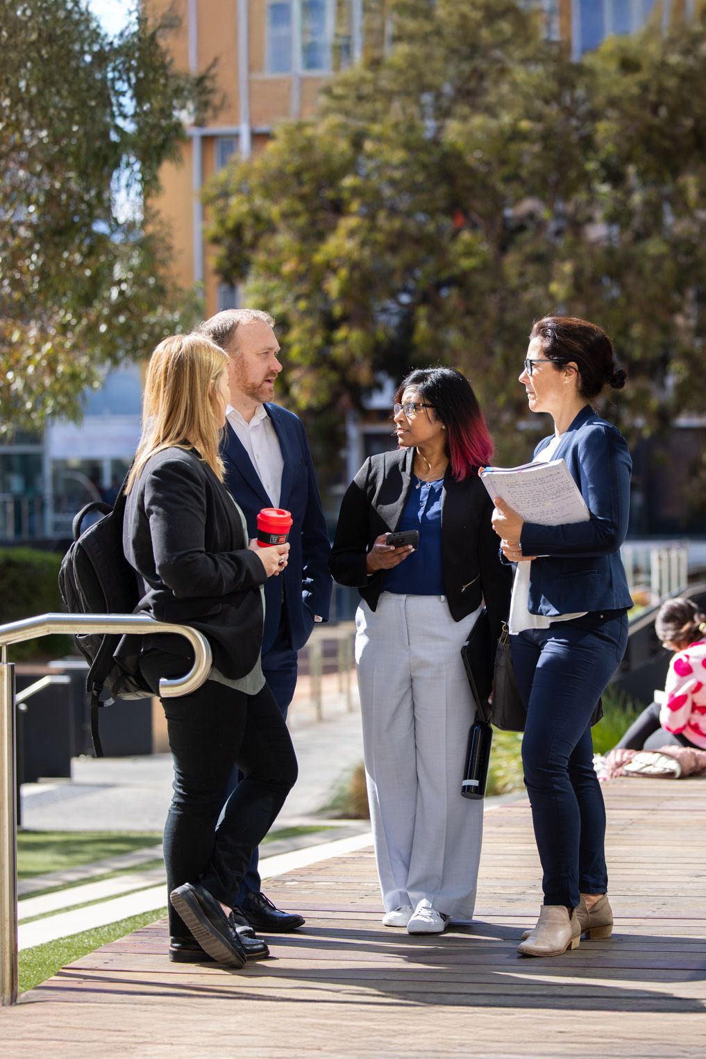 Swinburne Edge Stock 4 people having a conversation