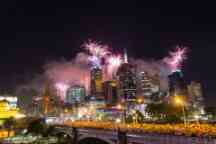 Melbourne skyline at night time with fireworks.