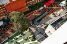 An aerial photo looking down at the hawthorn campus courtyard showing a students, steps, and a wheelchair-friendly ramp