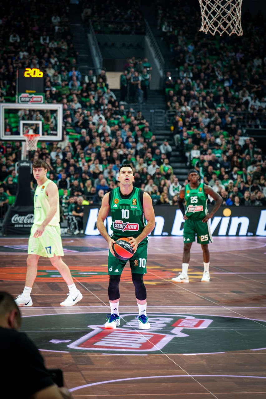 Panathinaikos 1 Basketball player preparing to shoot in a game