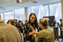 Two ladies talking at a Swinburne course advice event