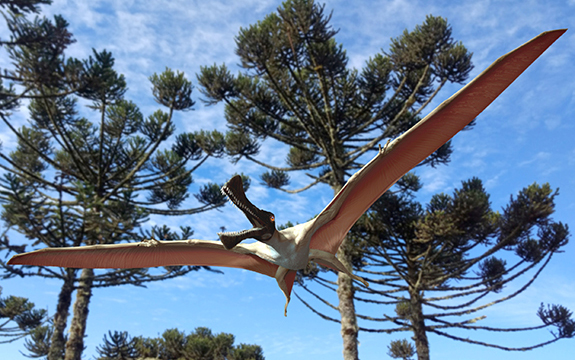 artist's illustration of winged reptile pterosaur