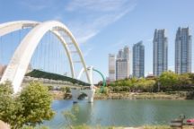 A white bridge and city building view