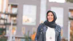 Muslim woman walking outdoors in the city