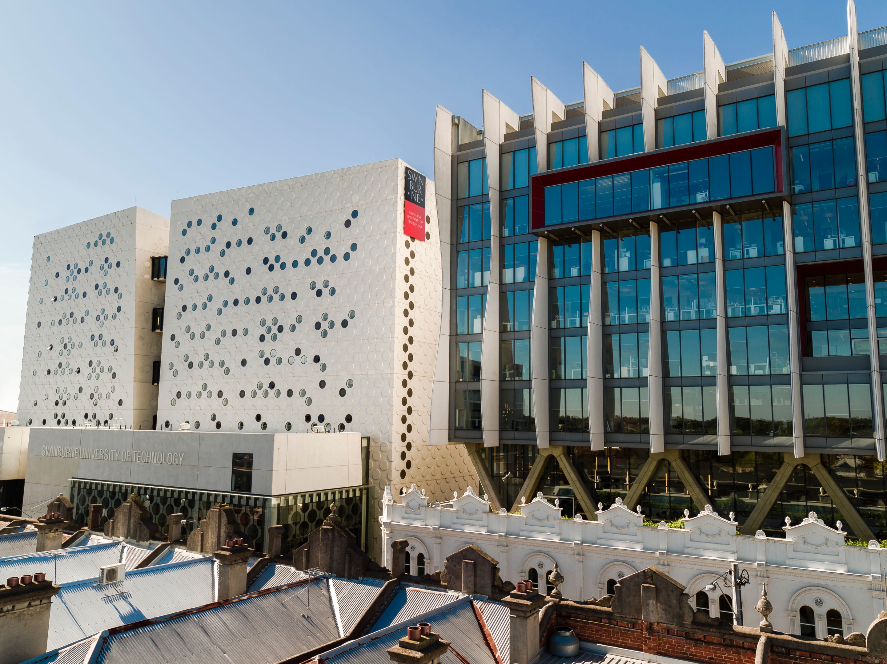 ATC AMDC Burwood Road facade facades of modern looking buildings with glass front and round holes