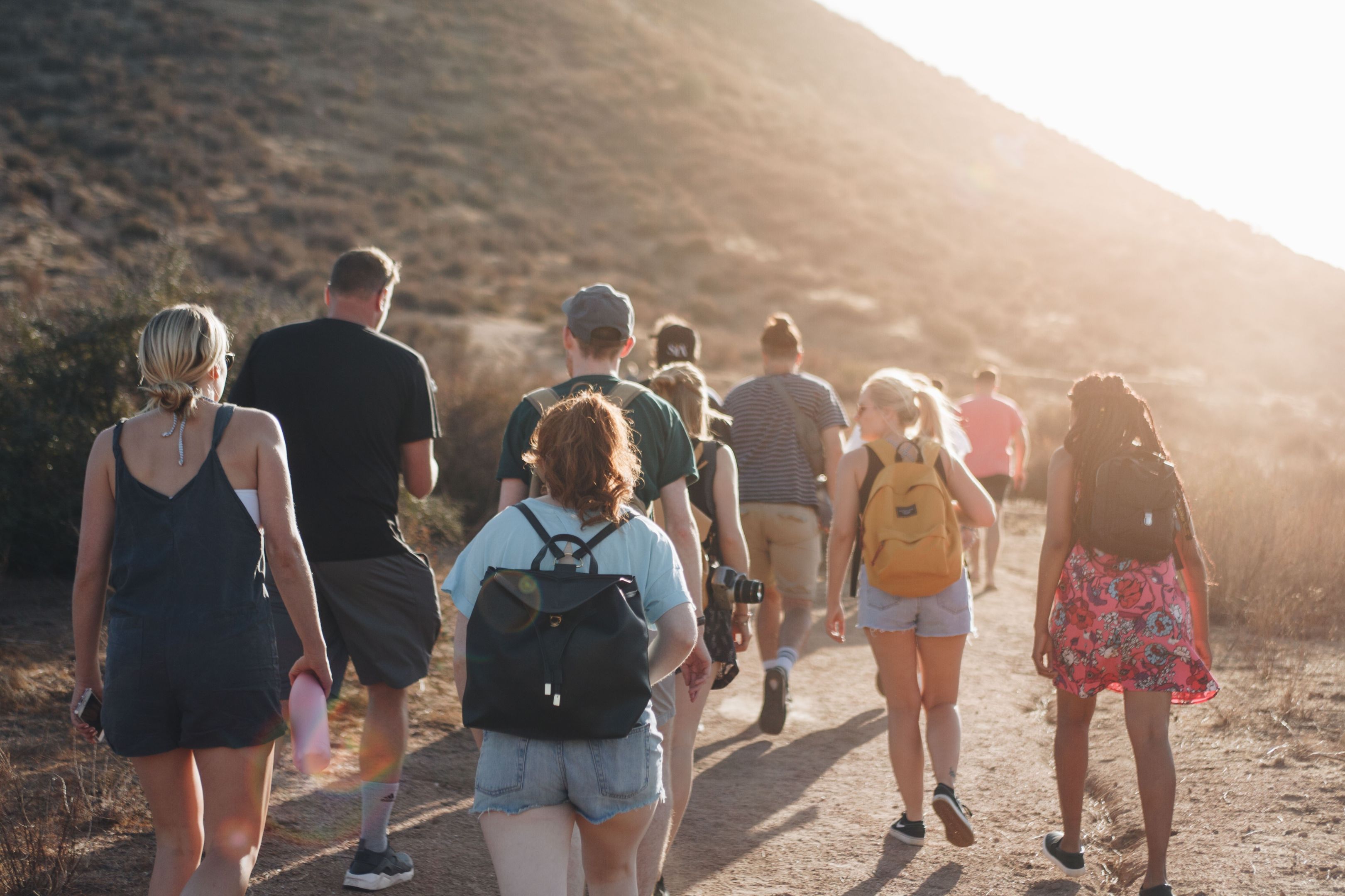 People trekking through a mountain