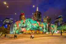 Christmas projections at Federation Square, Melbourne shown at night