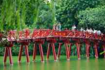 Hanoi red bridge. The wooden red painted bridge over the Hoan Kiem Lake connects the shore and the Jade Island on which Ngoc Son Temple stands