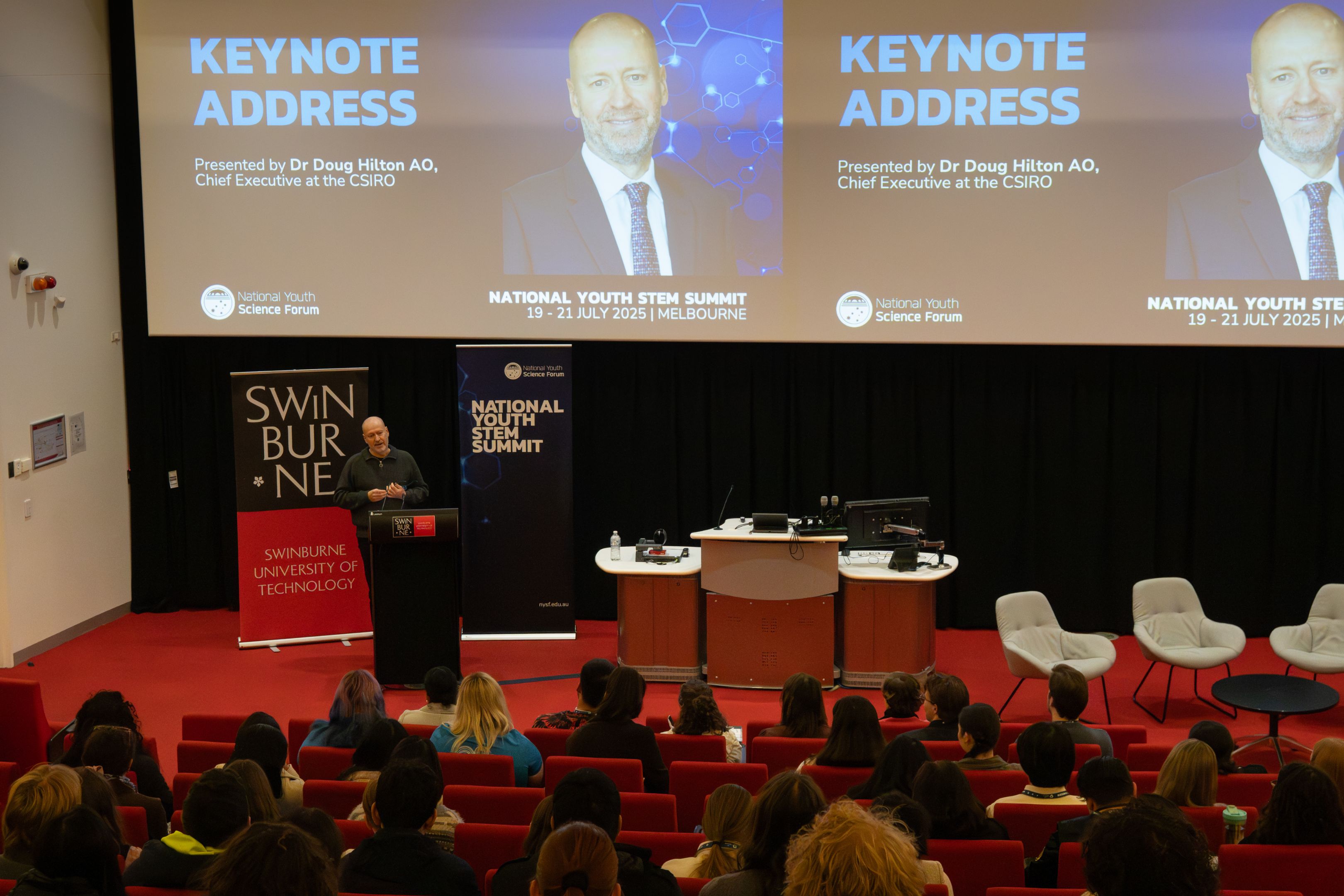 Dr Doug Hilton speaking at the 2025 National Youth STEM Summit