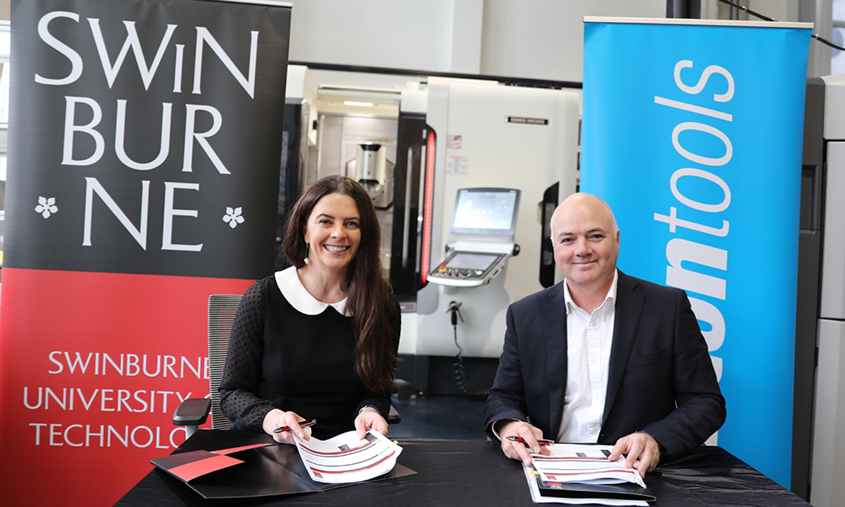 Bronwyn Fox and Peter Sutton seated in front of Swinburne and Sutton Tools banners