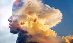 Close-up of a girl and layers of clouds