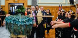 Prime Minister Anthony Albanese at New Zealand Parliament beside senior cultural adviser to Parliament Kura Moeahu during a Māori welcome ceremony. AAP Image/Mark Coote