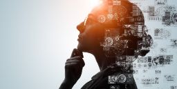 Image of person looking thoughtful with scientific elements floating holographically around them. 