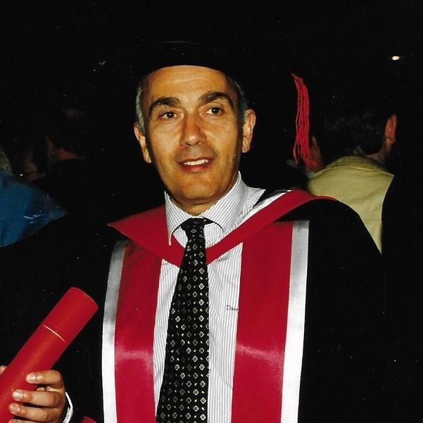 Pio Iovenitti in a graduation gown and cap