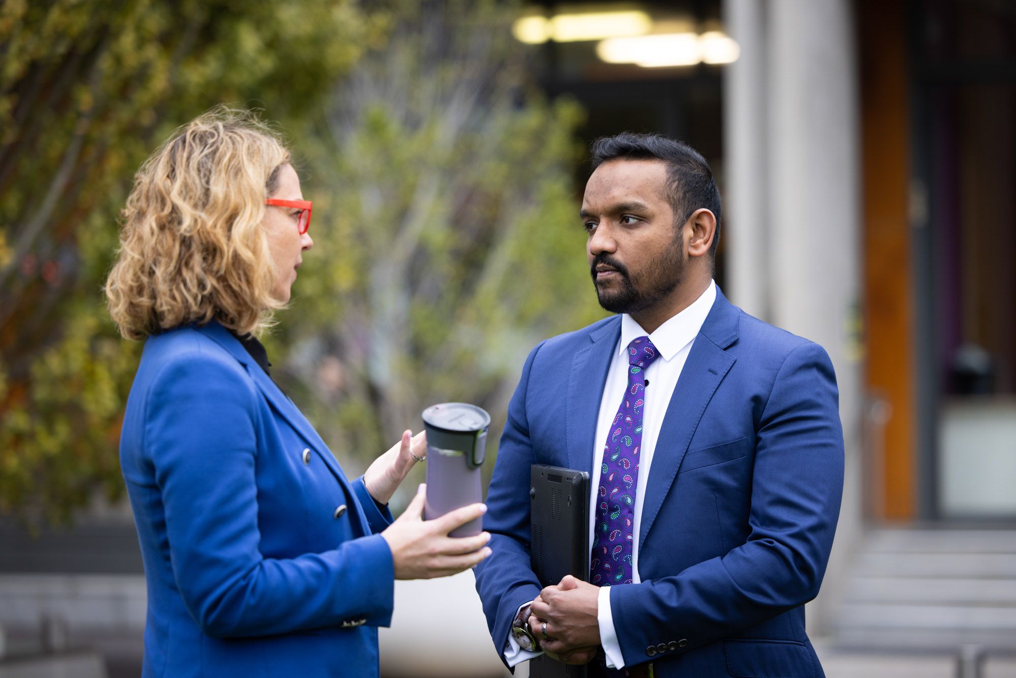 A woman and man having a serious conversation