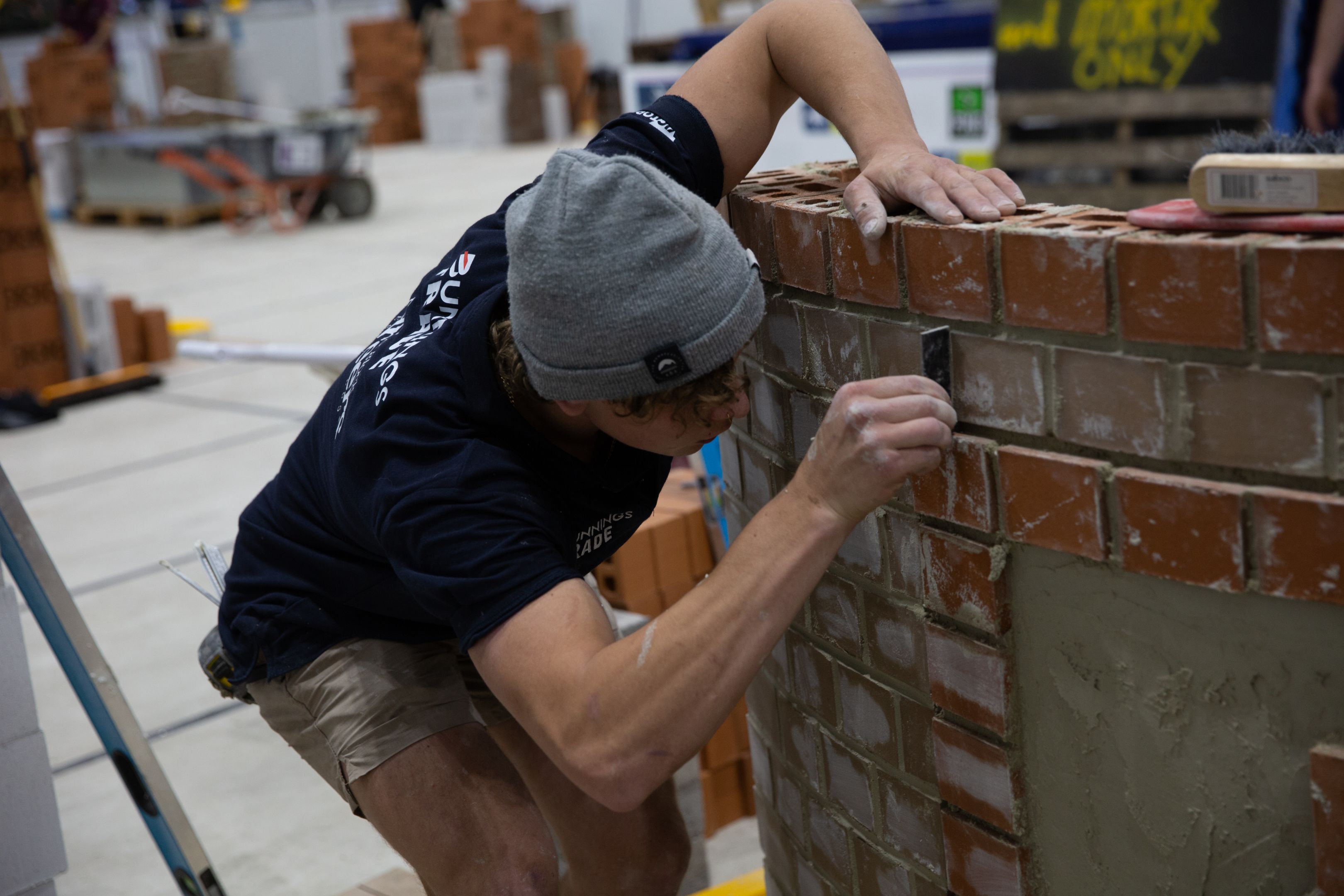 Blayde doing bricklaying during the WorldSkills competition