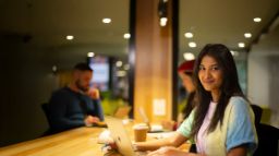 International student Geilee in library study space on Hawthorn campus
