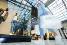Blurred lady carrying many shopping bags at a shopping mall