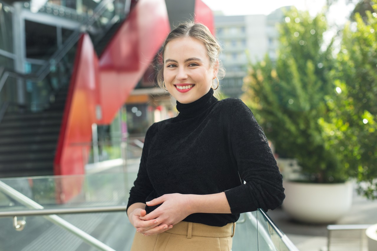 Law student at the Hawthorn campus smiling to camera 