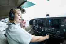 A professional piloting student inside an airplane at the Moorabbin Airport